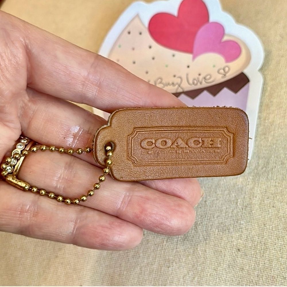Vintage Coach British Tan leather hangtag with OG “BALL CHAIN” stamped chain.